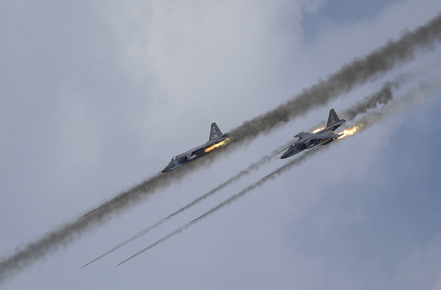 Russian Sukhoi Su-25 Frogfoot ground-attack planes perform during the Aviadarts military aviation competition at the Dubrovichi range near Ryazan, Russia, August 2, 2015. The aviation contest is part of the International Army Games, which are held in Russia from August 1-15, with participants from 17 countries, according to organisers. REUTERS/Maxim Shemetov - RTX1MQMY